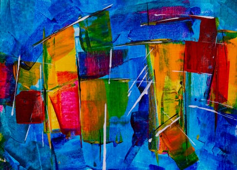 Colorful abstract expressionism painting with vivid brush strokes on canvas.